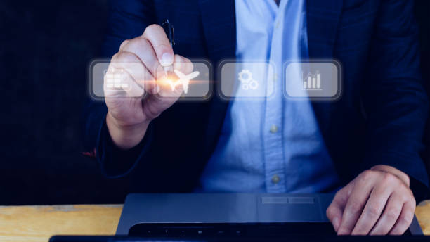 istock Businessman pointing finger touching to select flight by pressing touch screen airplane button,Business Airplane transportation concept 1448074441