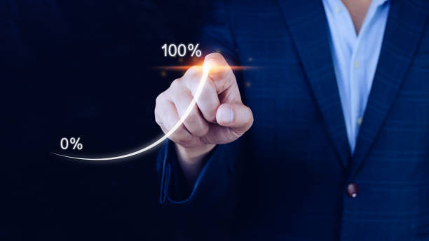 istock Businessman pointing touching to that has grown exponentially rapidly from 0 percent to 100 percent sales in short period of business success strategy and planning concept. 1448074448