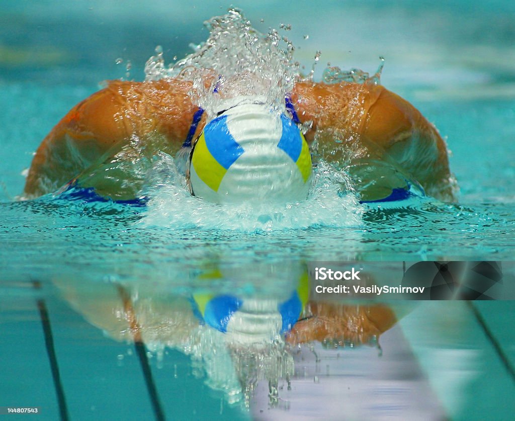 swimmer swimmer And its reflection Swimming Stock Photo