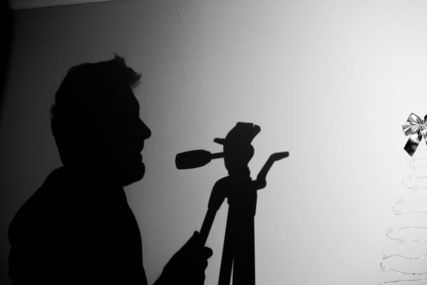 istock cinema tripod is held by a man 1448078102