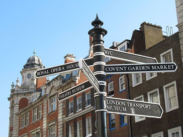 Black and white directional signs in London  Local interest sign in Covent Garden, London England covent garden photos stock pictures, royalty-free photos & images