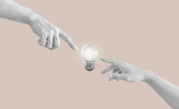 istock Digital collage, Hand reaching to glowing light bulb. Ideas, power, and energy concepts 1448086027