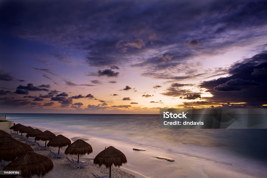 Mexico Sunrise along the white sand beaches of Cancun on the Yucatan Peninsula in Quintana Roo Mexico Beach Stock Photo