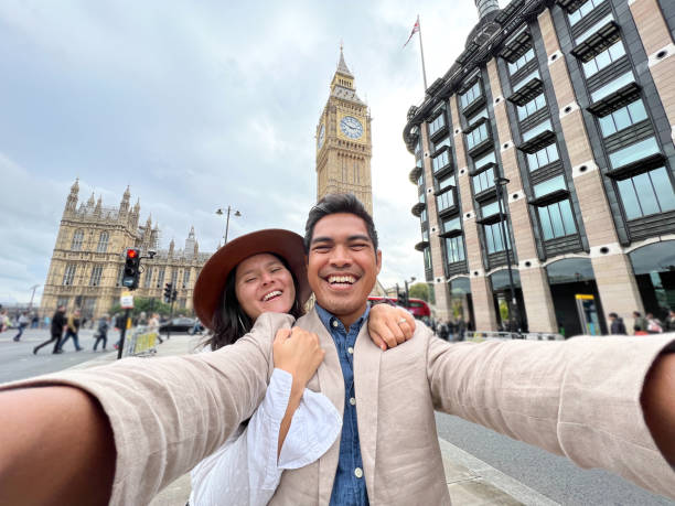 istock Diverse couple taking selfie in London 1448091864
