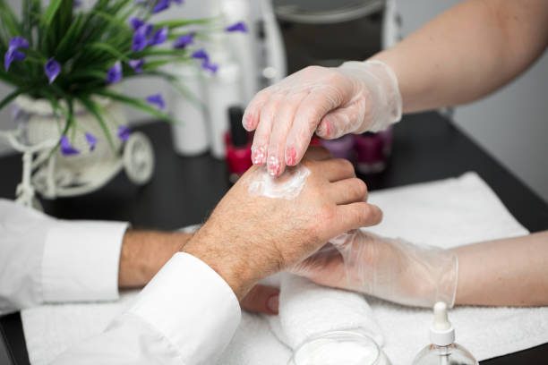 istock Hand cream. Massage after the manicure. 1448091950