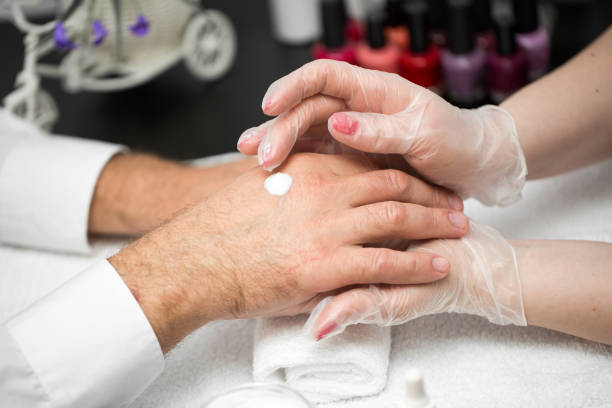 istock Hand cream. Massage after the manicure. 1448091970
