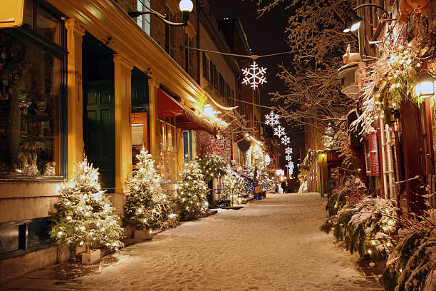 christmas night in quebec city - cafe snow stockfoto's en -beelden