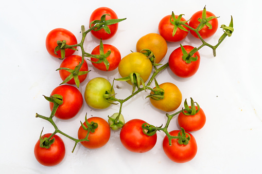 Full Frame Shot Of Tomatoes Against White Background