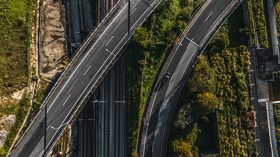 Aerial perspective on the intersection of several lanes of a highway and its geometric shape seen from above