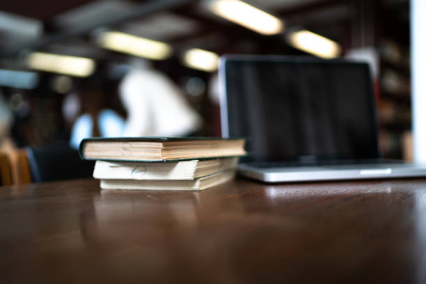 Laptop and books on the desk