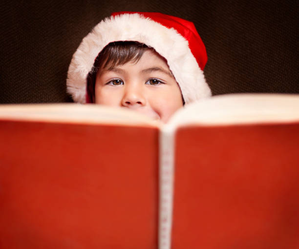 istock portrait of a child reading a book 1448105091