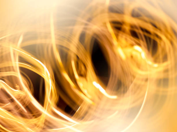 istock abstract blurred background with golden lines 1448105126