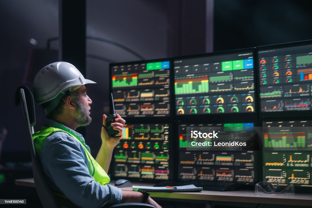 Midstream Operations Engineer Computer Main Engineer Operator And Computer Screens With Modern Following ...