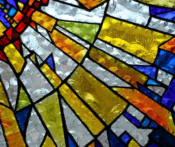 stainglass of an old church showing pattern and colors