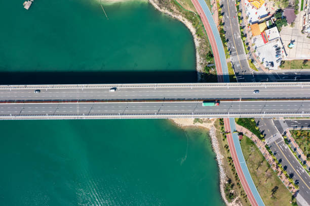 istock Moving truck on the bridge, ground transportation concept 1448107008