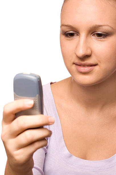 istock Woman dialing cell phone 144810881