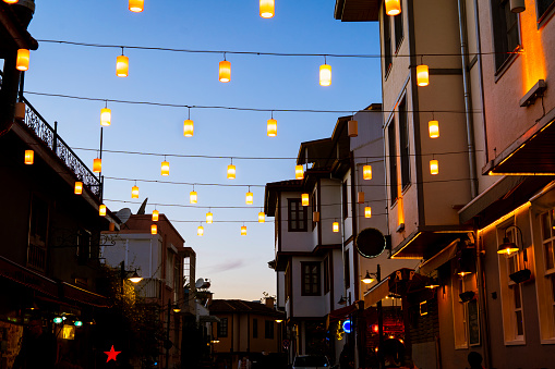Outdoor string lights hanging in line.