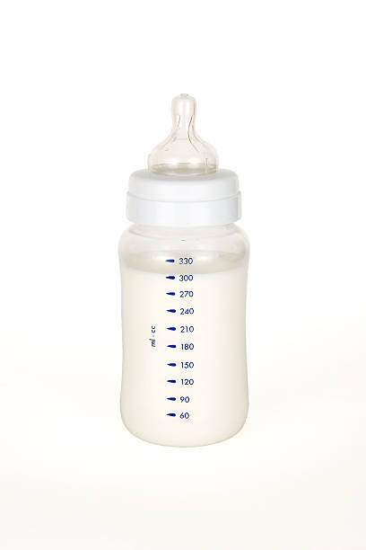 istock A baby bottle full of formula milk on a white background 144811253