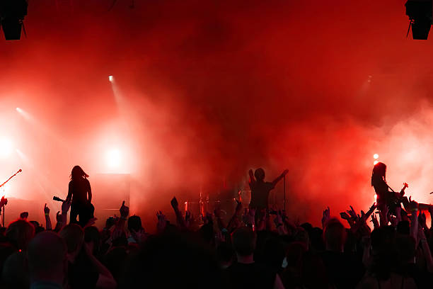 A large crowd at a rock concert stock photo