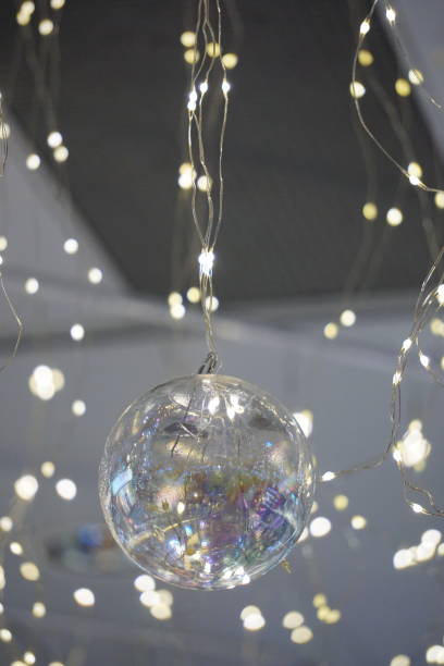 istock Christmas tree ball decoration with lights around 1448117750