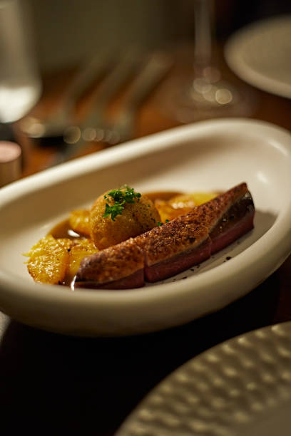 istock Dry aged duck breast with potato croquet 1448118927