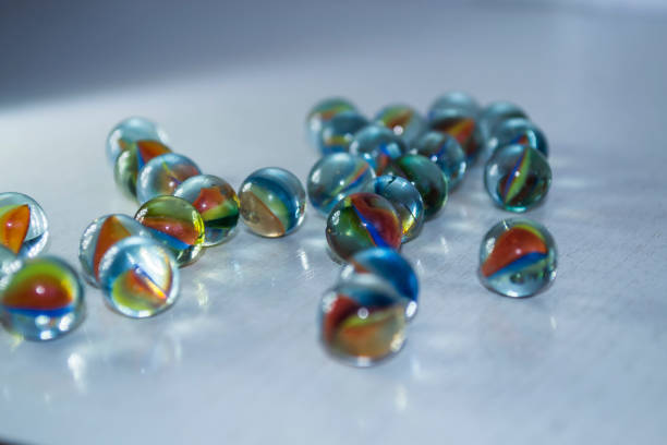 Colored balls on a white wooden background. High quality photo