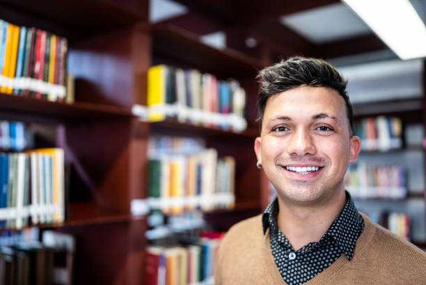 istock Portrait of a young man in the library 1448121464