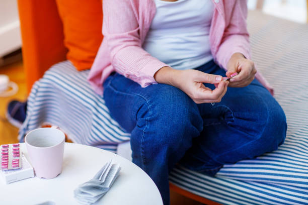 istock Mature Woman Taking Pill 1448124088