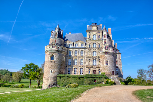 Loire Valley, France - April 19, 2019: The Castle of Brissac, a renaissance castle rebuilt in the 15th century by one of the ministers to King Charles VII, situated in Brissac Quince, nearby Angers.