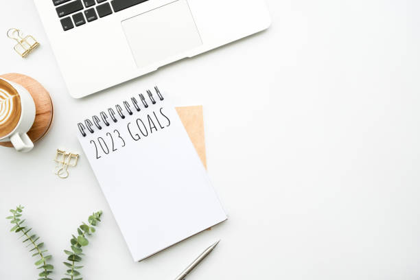 istock Notebook with 2023 goals text on it to apply new year resolutions and plan. 1448126638