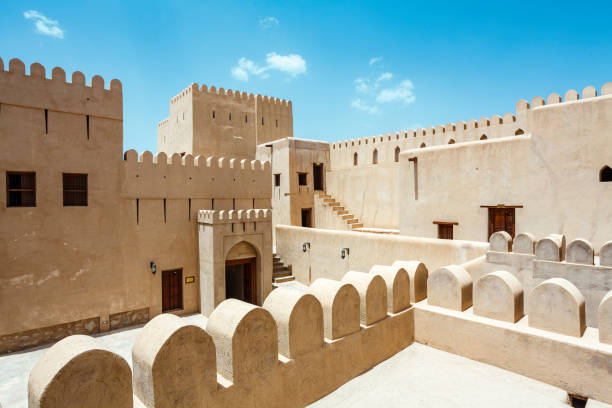 exterior of nizwa fort in nizwa, oman, middle east - nizwa imagens e fotografias de stock