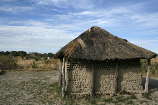 An African hut made out of old cans and mud, situated in the Okavango Delta, Botswana.