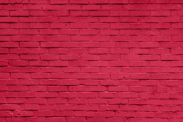 istock Magenta brick wall texture close up. Top view. Modern brick wall wallpaper design for web or graphic art projects. Abstract background for business cards and covers. 1448129910