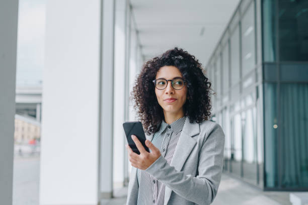 istock Business woman using smartphone 1448133577