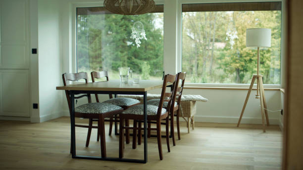 istock Interior of a modern dining room in a high-end apartment with large windows 1448133742