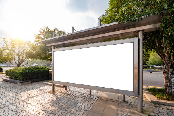 The bus stop shelters and advertising light boxes The bus stop shelters and advertising light boxes bus shelter stock pictures, royalty-free photos & images