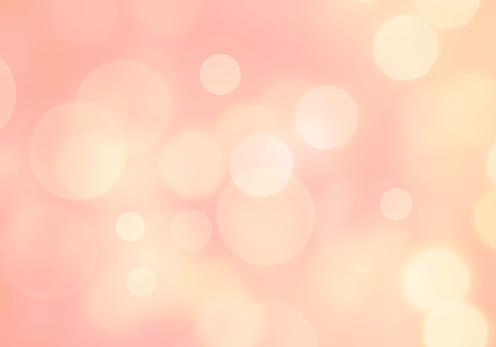 Pink yellow soft blurred background. Glowing bokeh backdrop.