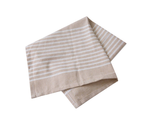 istock Brown beige kitchen towel isolated on white, folded napkin, food cloth decor. 1448142486