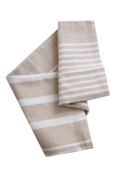 istock Brown beige kitchen towel isolated on white, folded napkin, food cloth decor. 1448142490