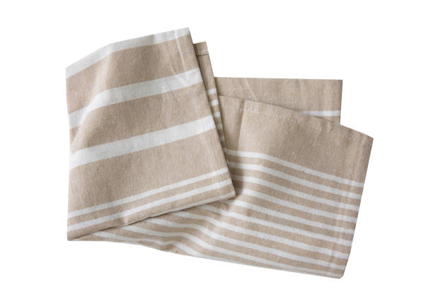 istock Brown beige kitchen towel isolated on white, folded napkin, food cloth decor. 1448142497