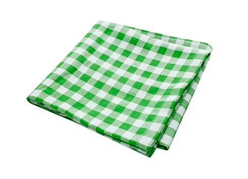 Green kitchen folded napkin, picnic cloth isolated. Gingham towel.Food decor.