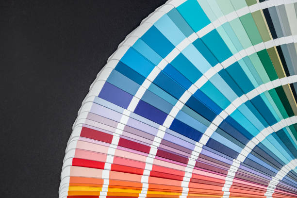 istock different sepmler color palettes and samples laid out on the table isolated. 1448144025
