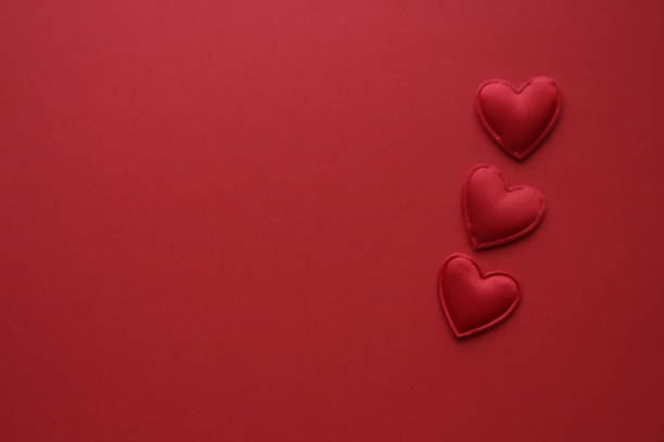 istock Red heart on a red background. Place for text. Valentine. 1448145155