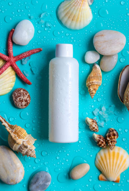 istock Moisturizing lotion cream on a sea background. Selective focus. 1448145537