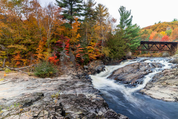 istock Sainte Ursule Waterfall with fall colors in background . Canada. 1448146790