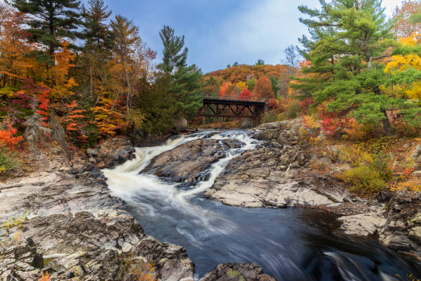 istock Sainte Ursule Waterfall with fall colors in background . Canada. 1448146796