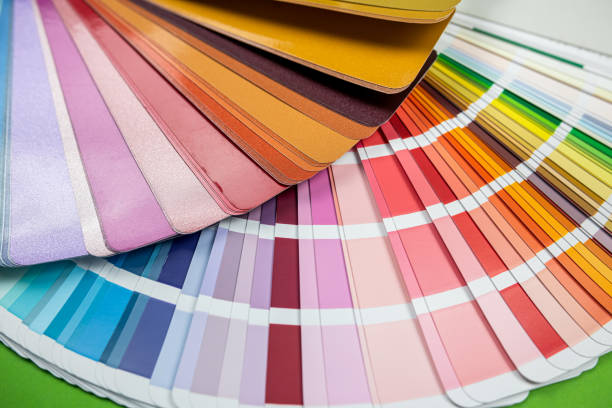 istock Color samples for painting on a wooden table close-up isolated. 1448148676