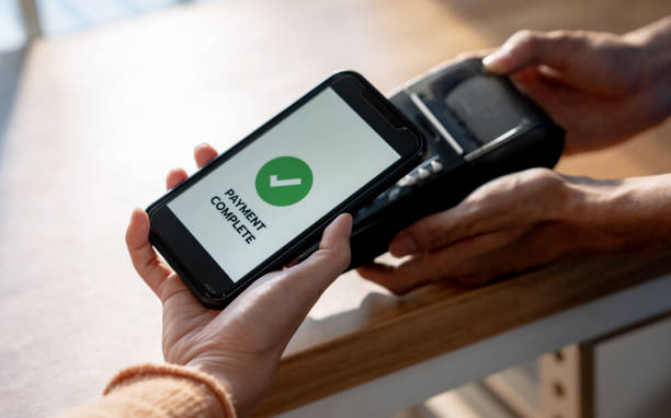 istock Customers use their phones to scan to pay. 1448148750