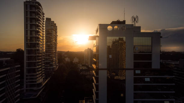 istock Sunset at city skyscrapers 1448148841