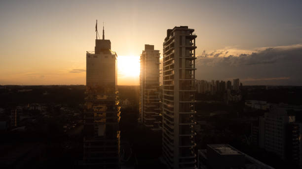 istock Sunset at city skyscrapers 1448148843